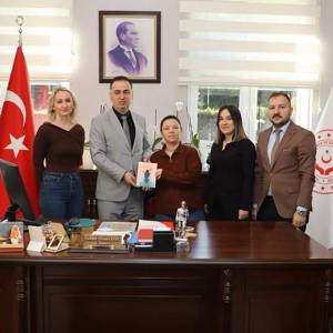 Özel Kuzey Bakım Merkezinden hizmet almakta olan Ümmühan KALENDER’ in şiir kitabının tanıtımı ve imza günü gerçekleştirilmiştir. - fotoğraf 1